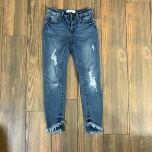 Distressed raw hem jeans